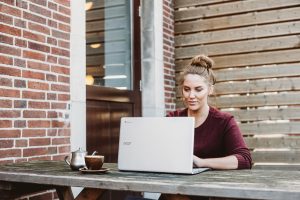 woman computer real estate house selling