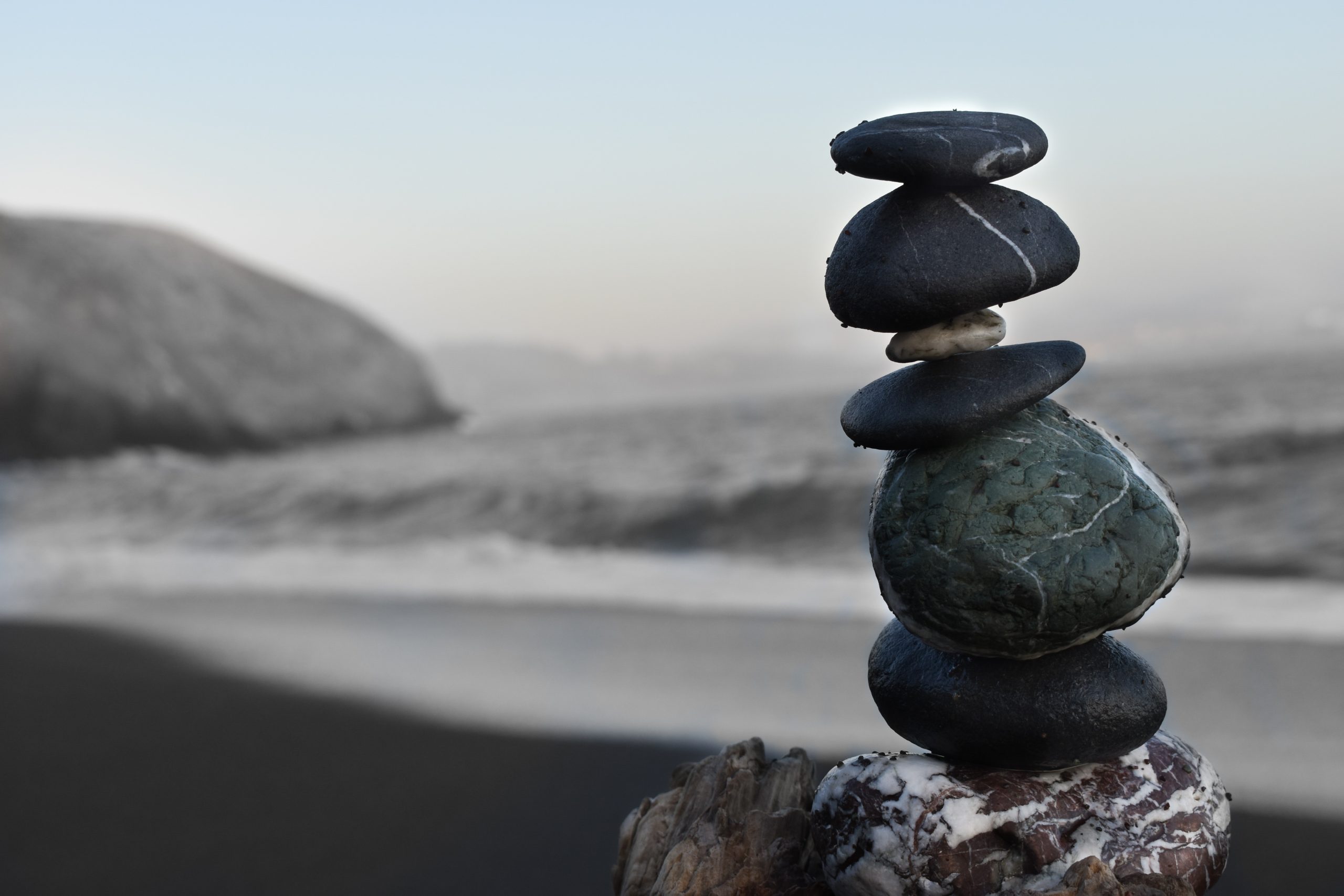 colton-sturgeon-6KkYYqTEDwQ-unsplash Balancing rocks